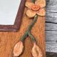 Miroir en bois, sculpté à décor de fleurs