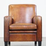 Art Deco design sheepskin leather armchair with a stunning patina