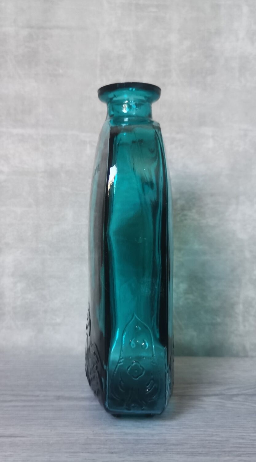 Blue engraved glass bottles