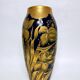 Lucien Michelaud, Limoges, large blue porcelain vase from the kiln with iris decoration.