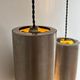 Pair of vintage brushed metal pendant lamps, France 1960