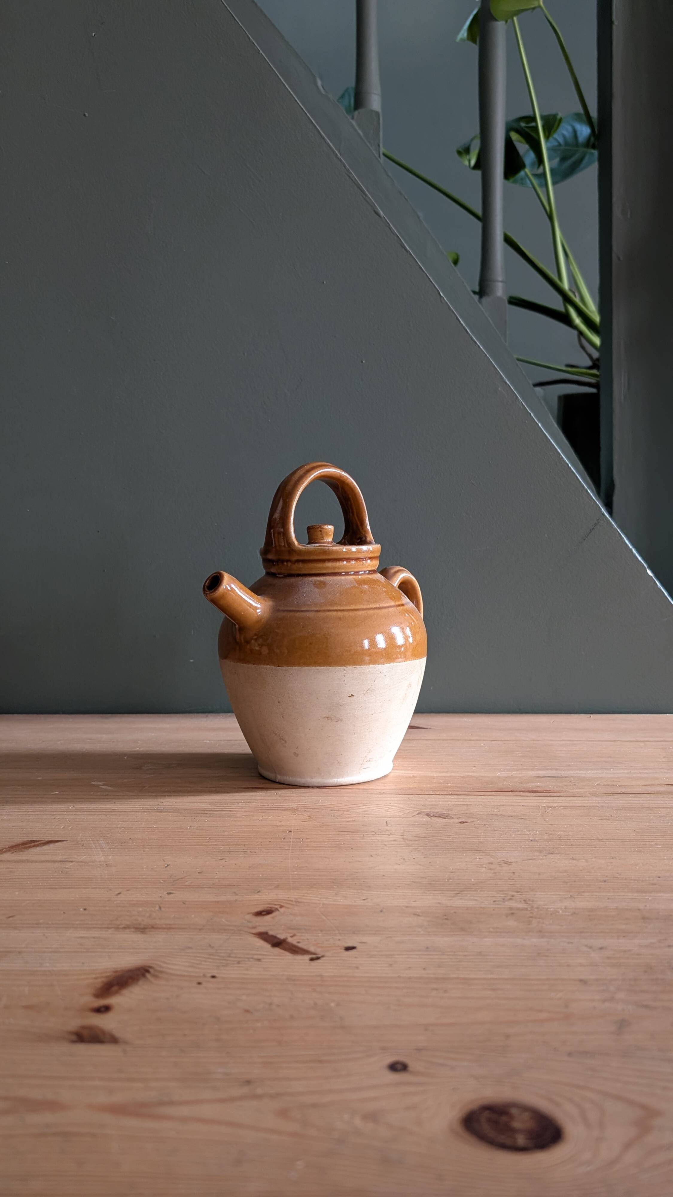 Glazed terracotta jug