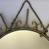 Miroir soleil en métal doré