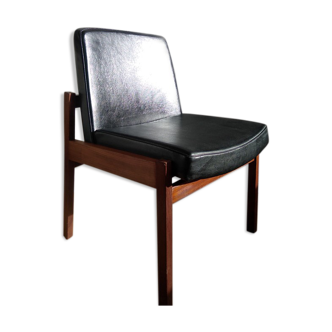 Massive teak and black skai armchair from the 1960s