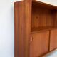 Vintage wooden cabinet with sliding doors