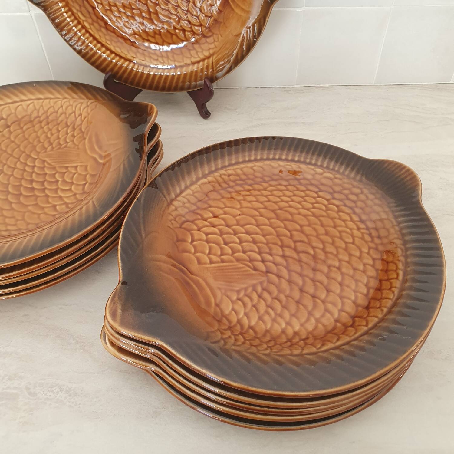 Sarreguemines / 11 earthenware fish-shaped plates