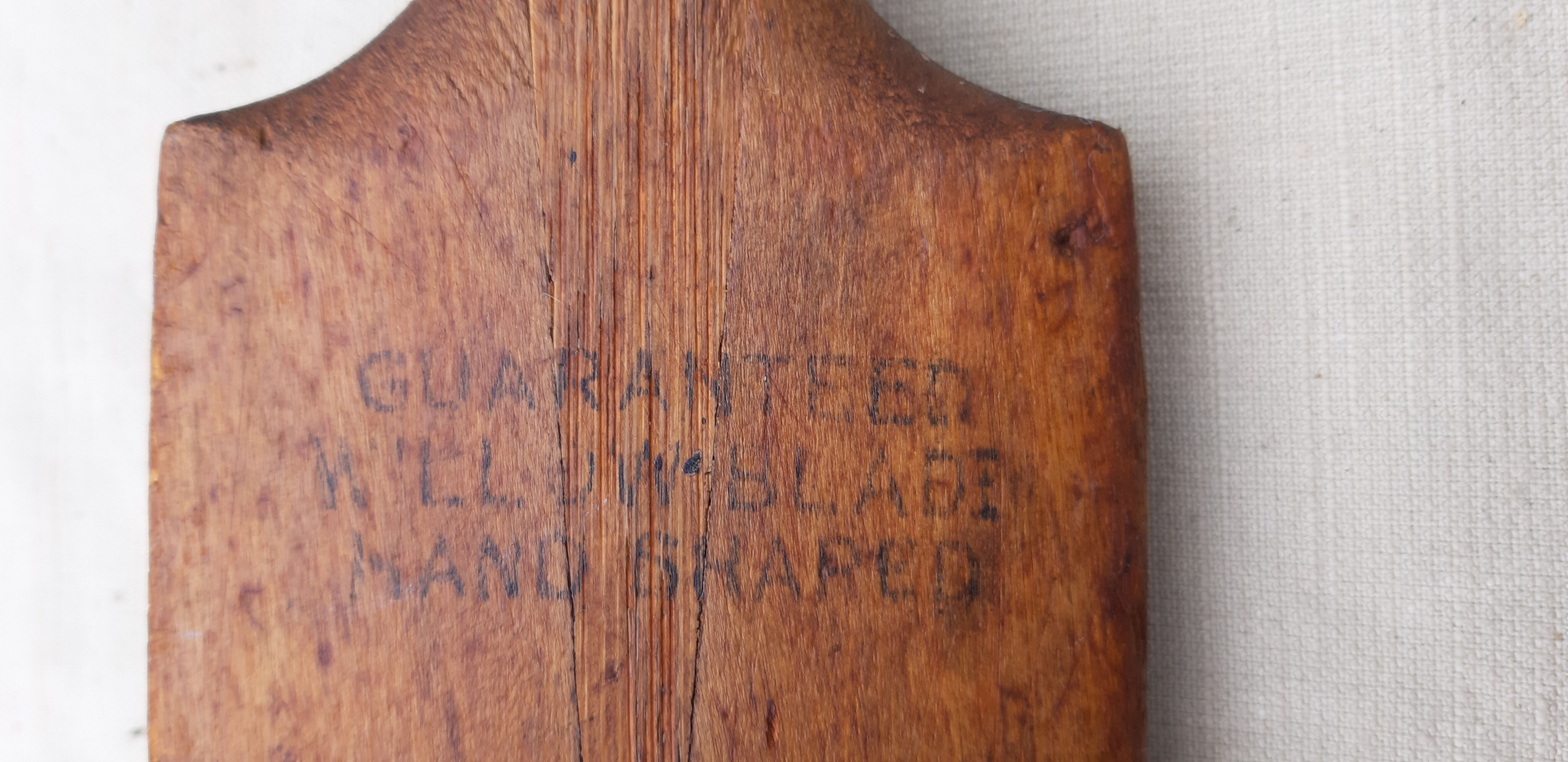 Ancient cricket bat in wood