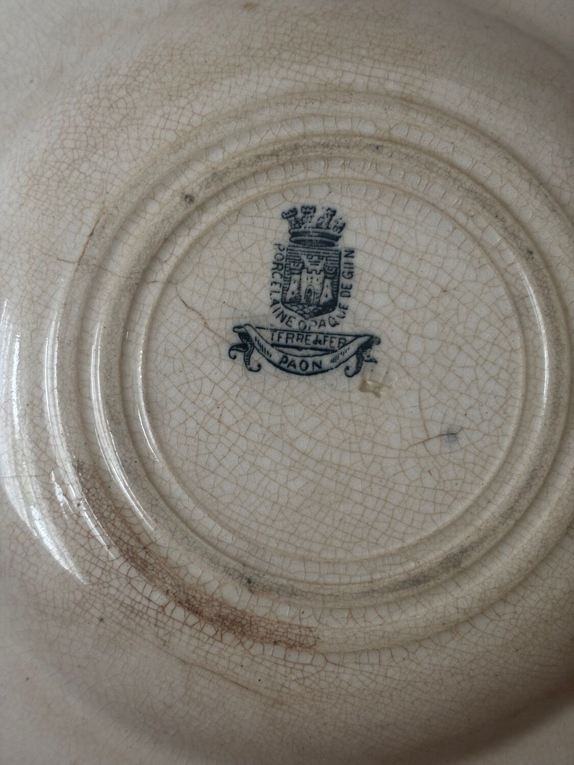 Old hollow plate Gien Terre de Fer Peafowl