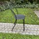 Chaise noire en fer forgé vintage 1980