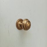 Vintage furniture knob in gilded brass