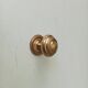 Vintage furniture knob in gilded brass