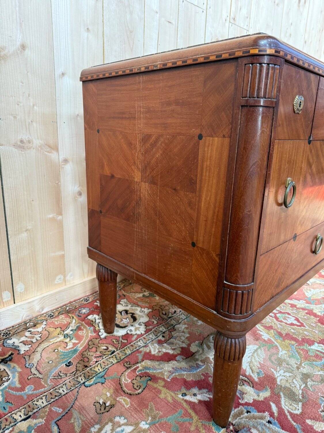Art Deco walnut and black marble commode from the 1960s.
