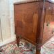 Art Deco walnut and black marble commode from the 1960s.