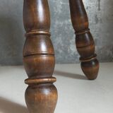 Low tripod stool in vintage turned solid wood