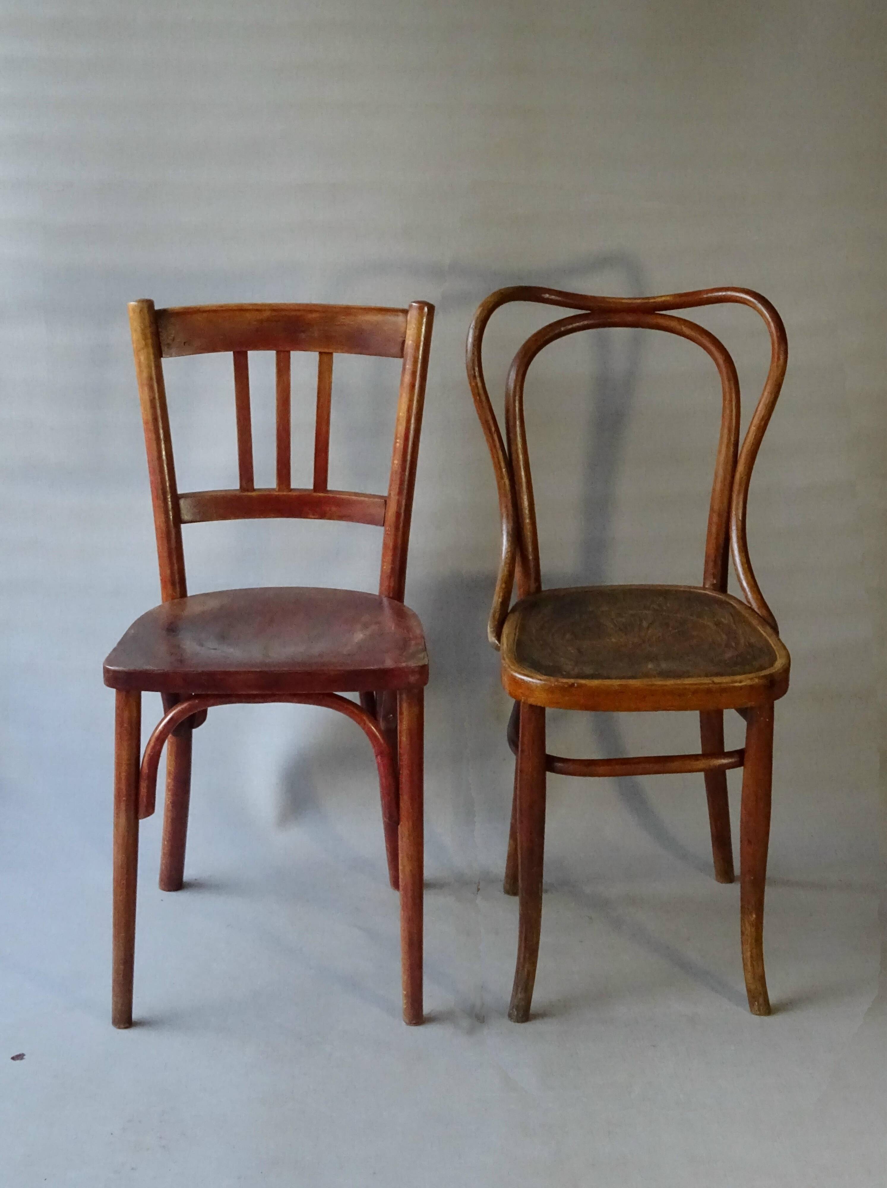 Set of 36 mismatched Bistrot chairs, 1920 to 1950, wooden seats.