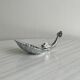 Soap dish, shell-shaped lightweight metal catchall.