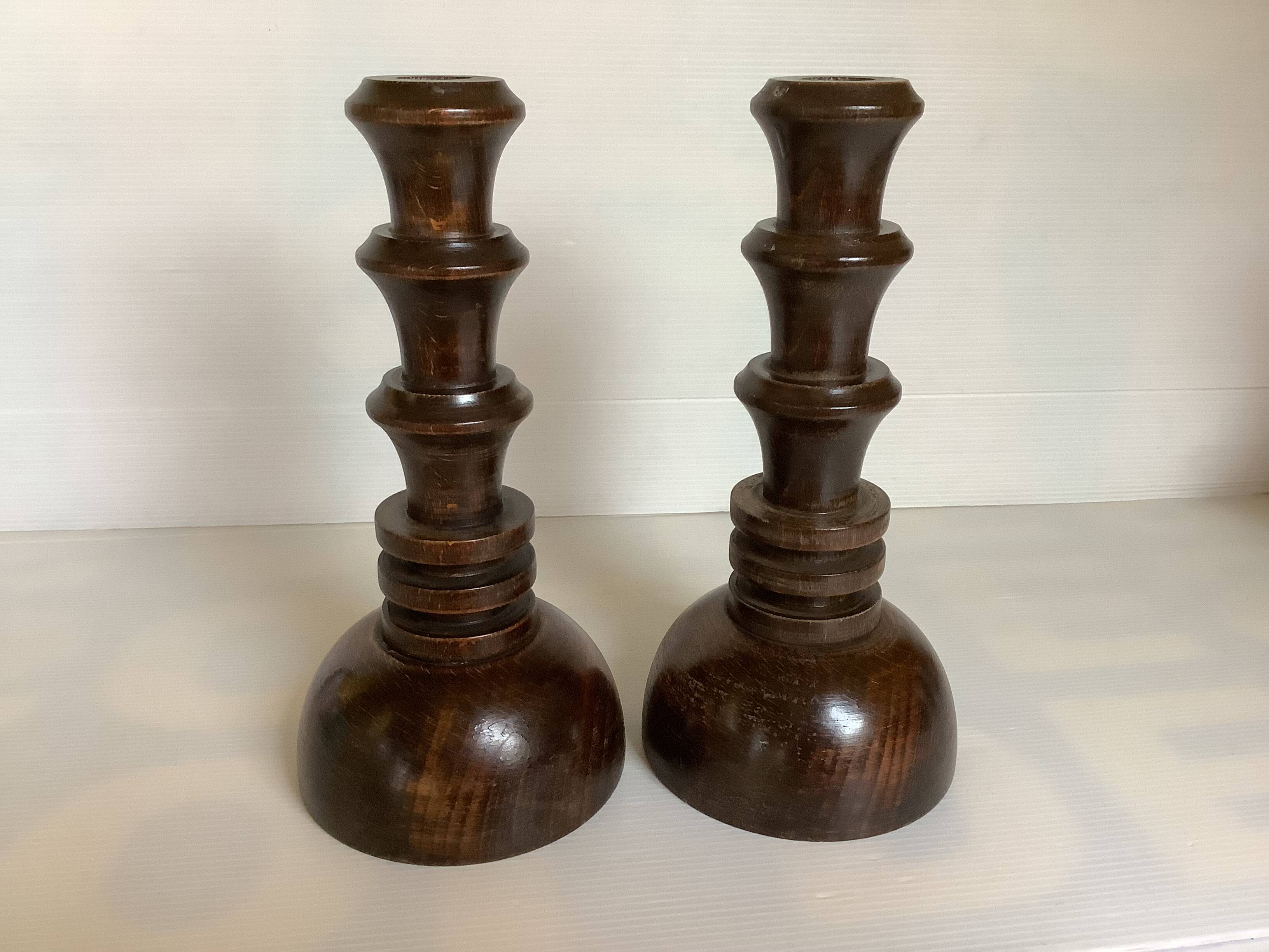 Pair of old wooden candlesticks