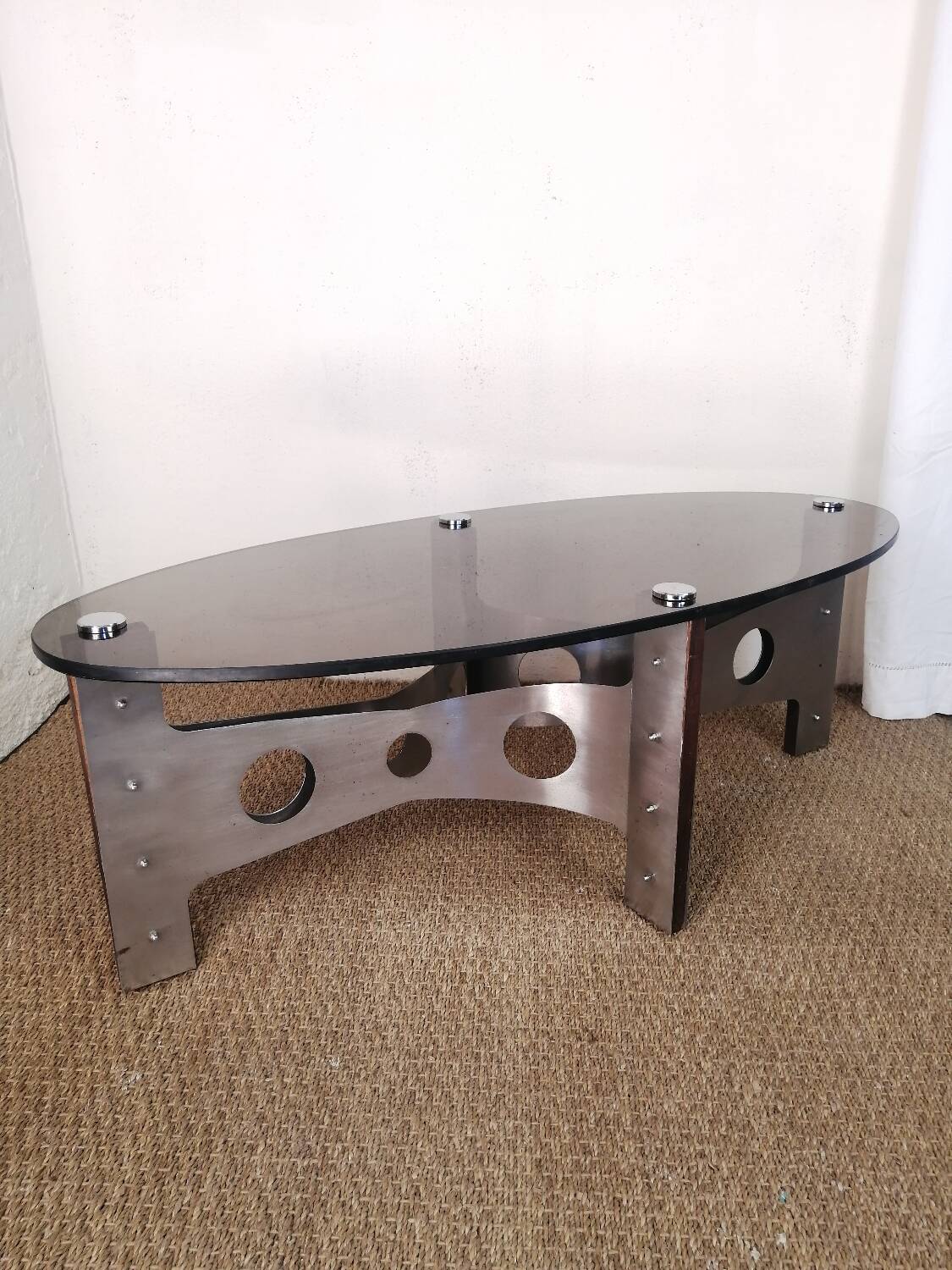 Vintage design coffee table in brushed aluminum and glass top.