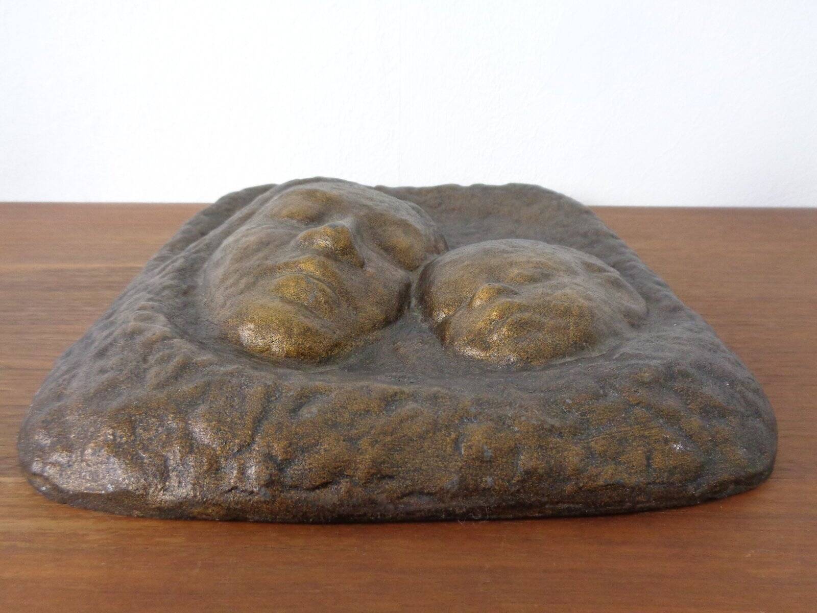 German bronze relief of mother with baby, 1940s.