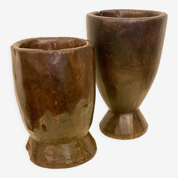 Old heavy wooden pots