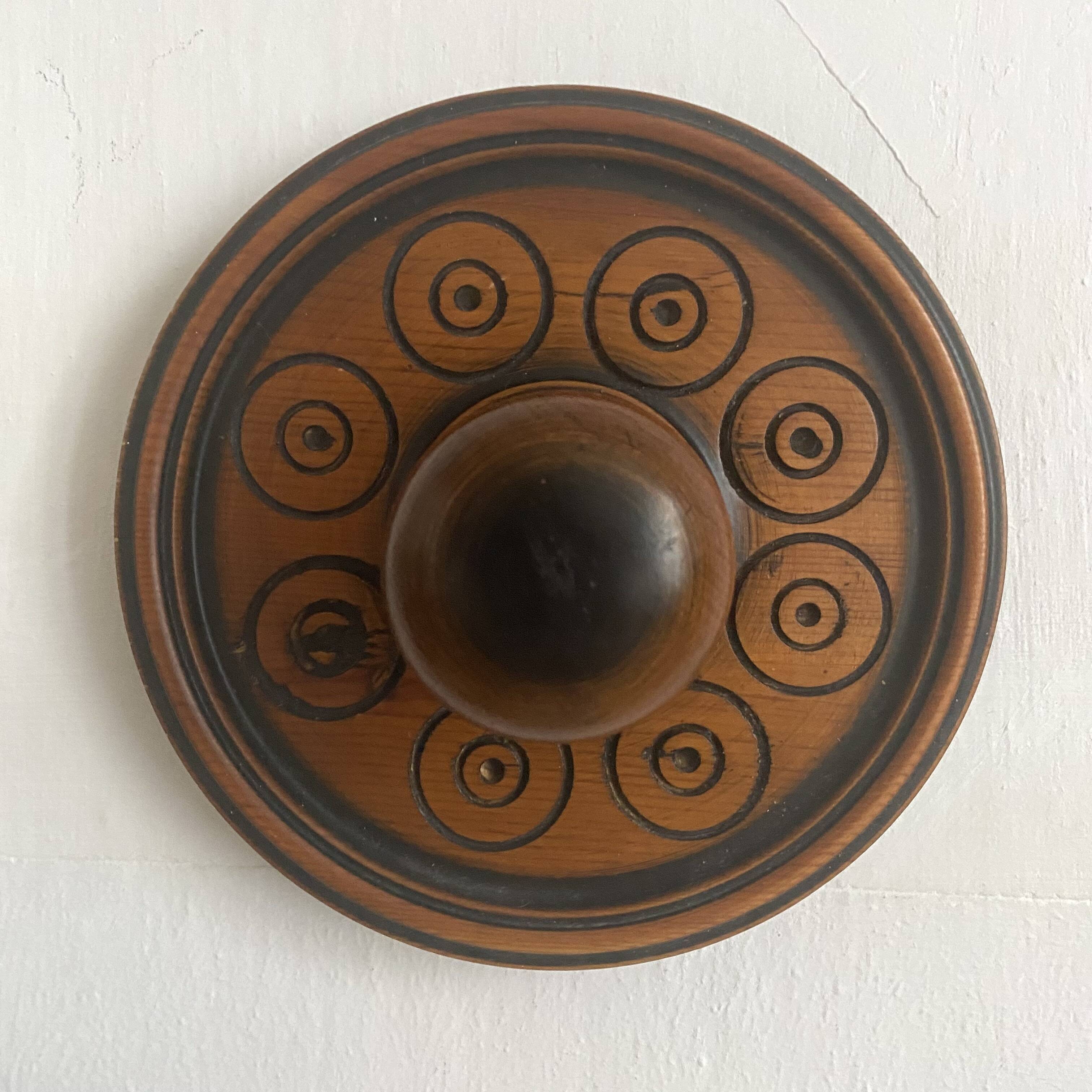 Pair of carved wooden wall hooks