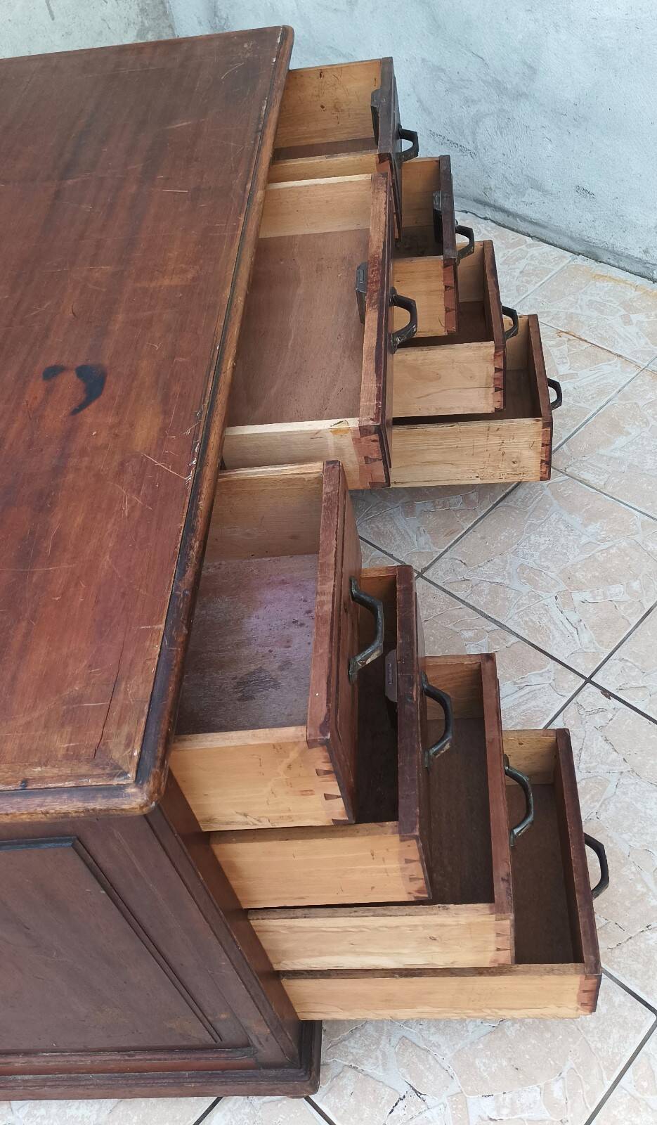 Vintage double-sided mahogany desk with 18 drawers.