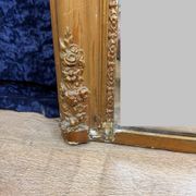 Empire period mirror in wood and gilded stucco circa 1810-1820
