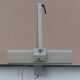 WALDMANN articulated workshop lamp with two industrial clamp arms for architects.