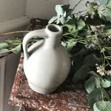 Pitcher with ceramic handle
