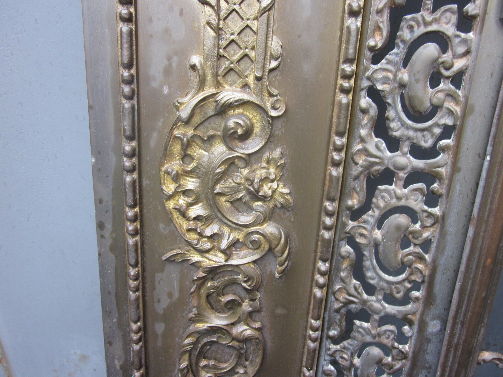 Front of the old fireplace all in bronze