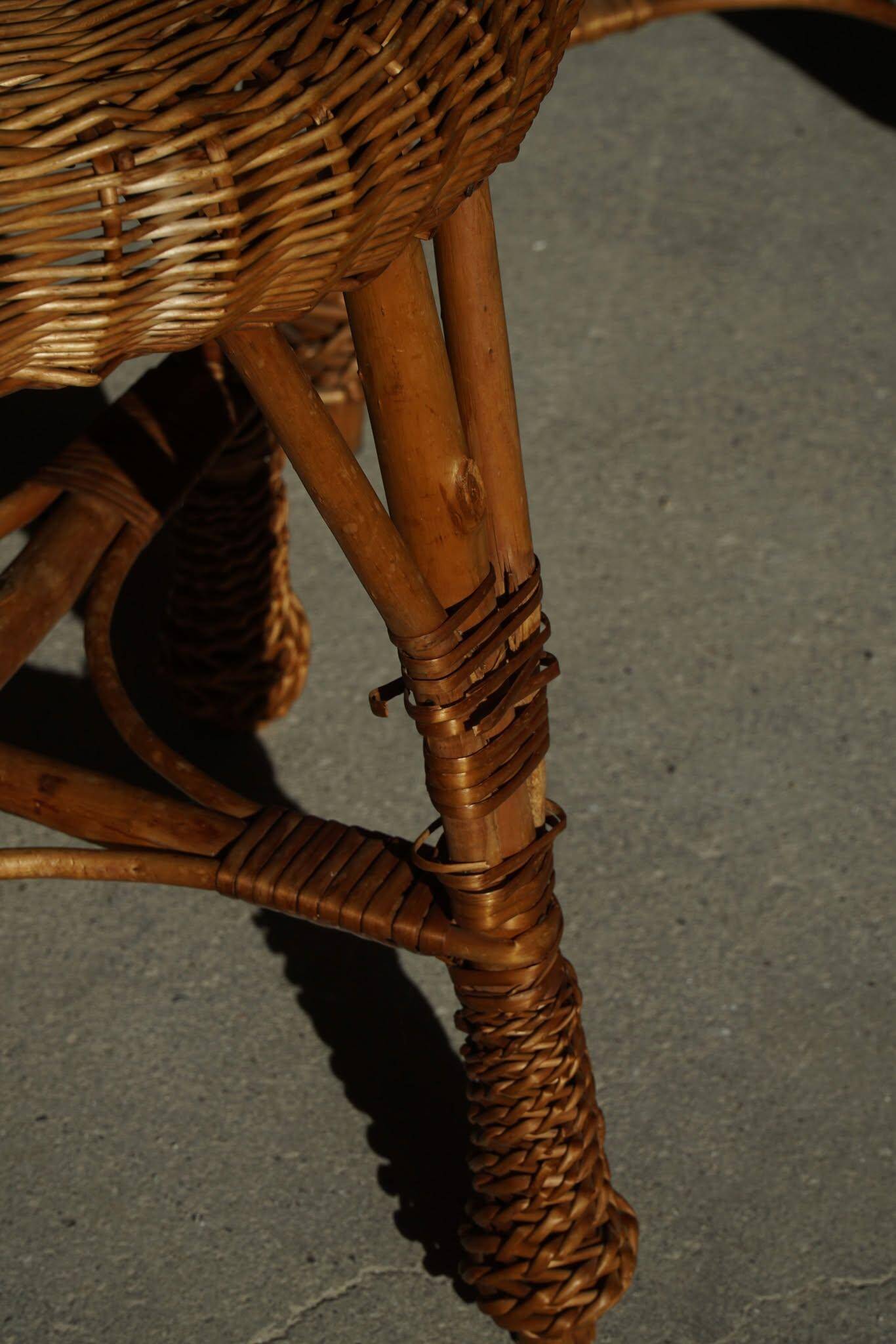 A set of 4 vintage Scandinavian rattan stools, in the style of Tony Paul, from the 1960s.
