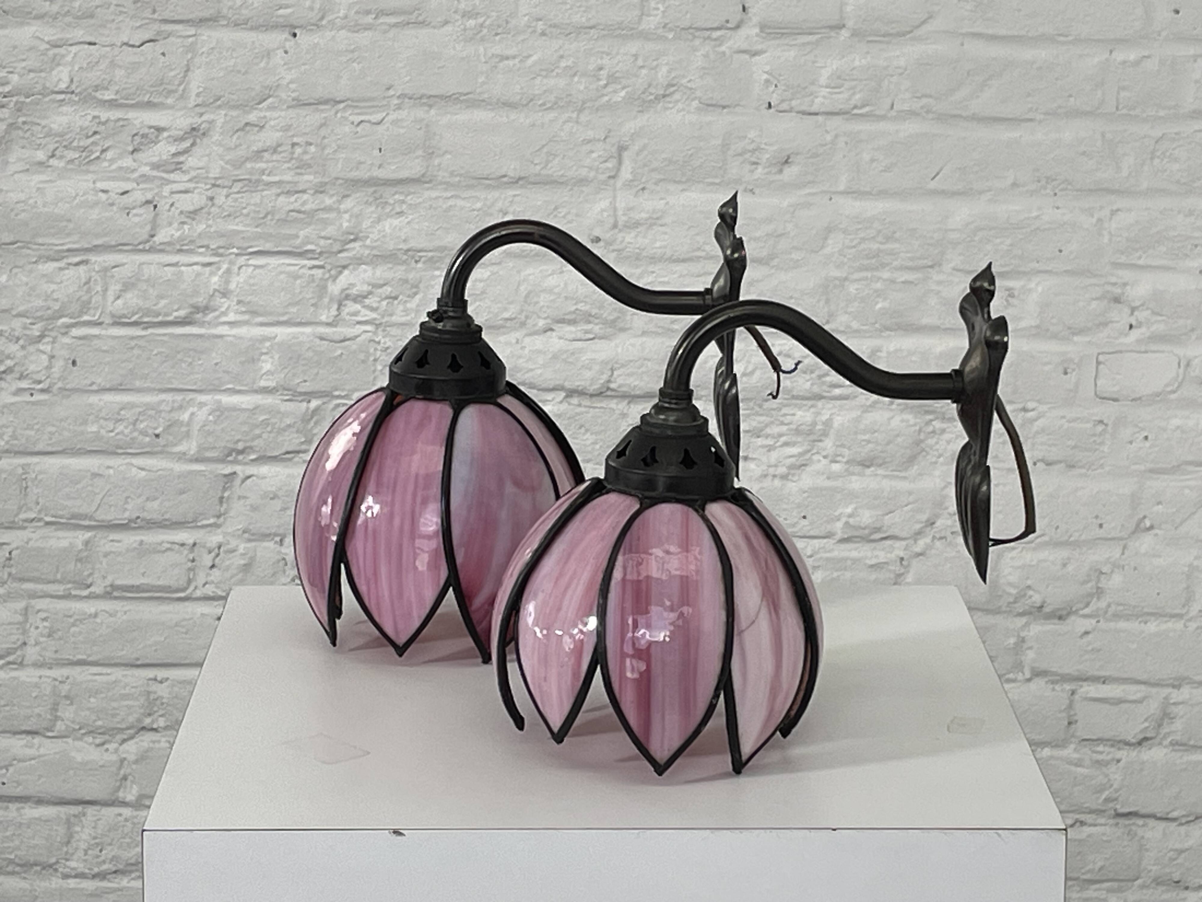 pair of iron wall lights and Tiffany style glass legs