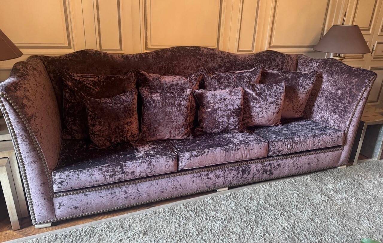 Purple velvet sofa
