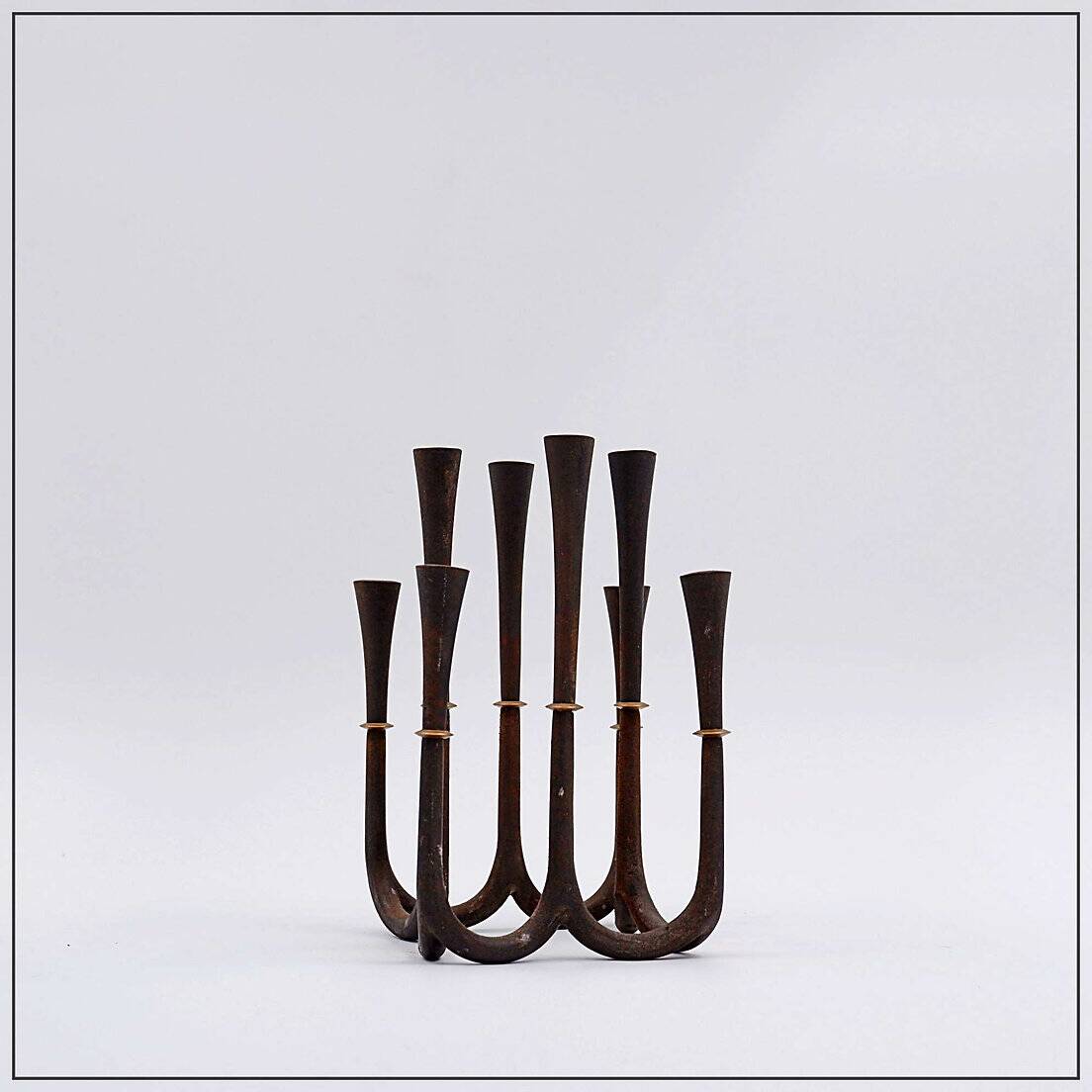 Cast iron and brass candle holder by Jens Quistgaard for Dansk designs, 1960