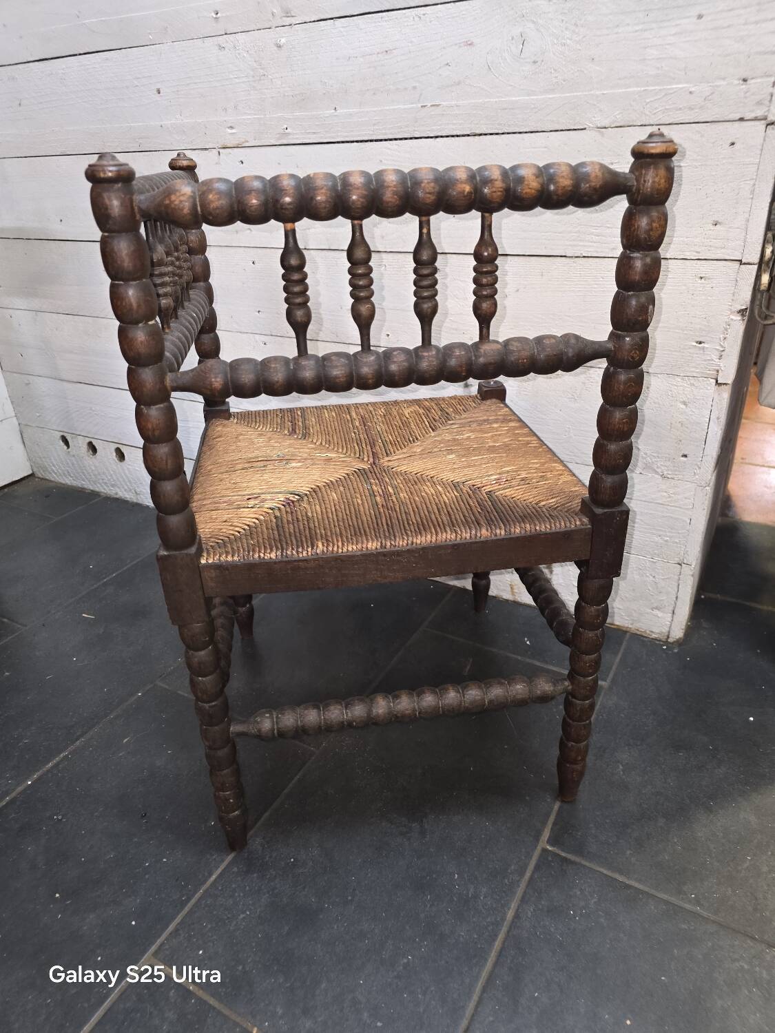 Antique corner fireplace armchair