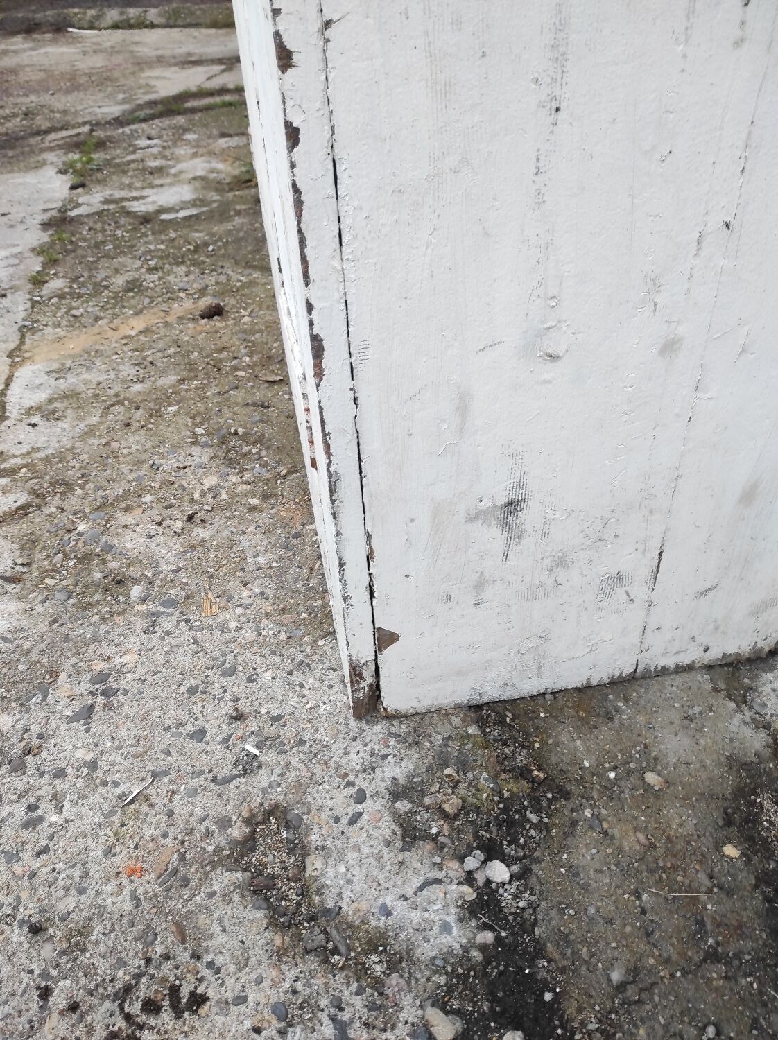 Old rustic Parisian wardrobe patinated white in oak and fir