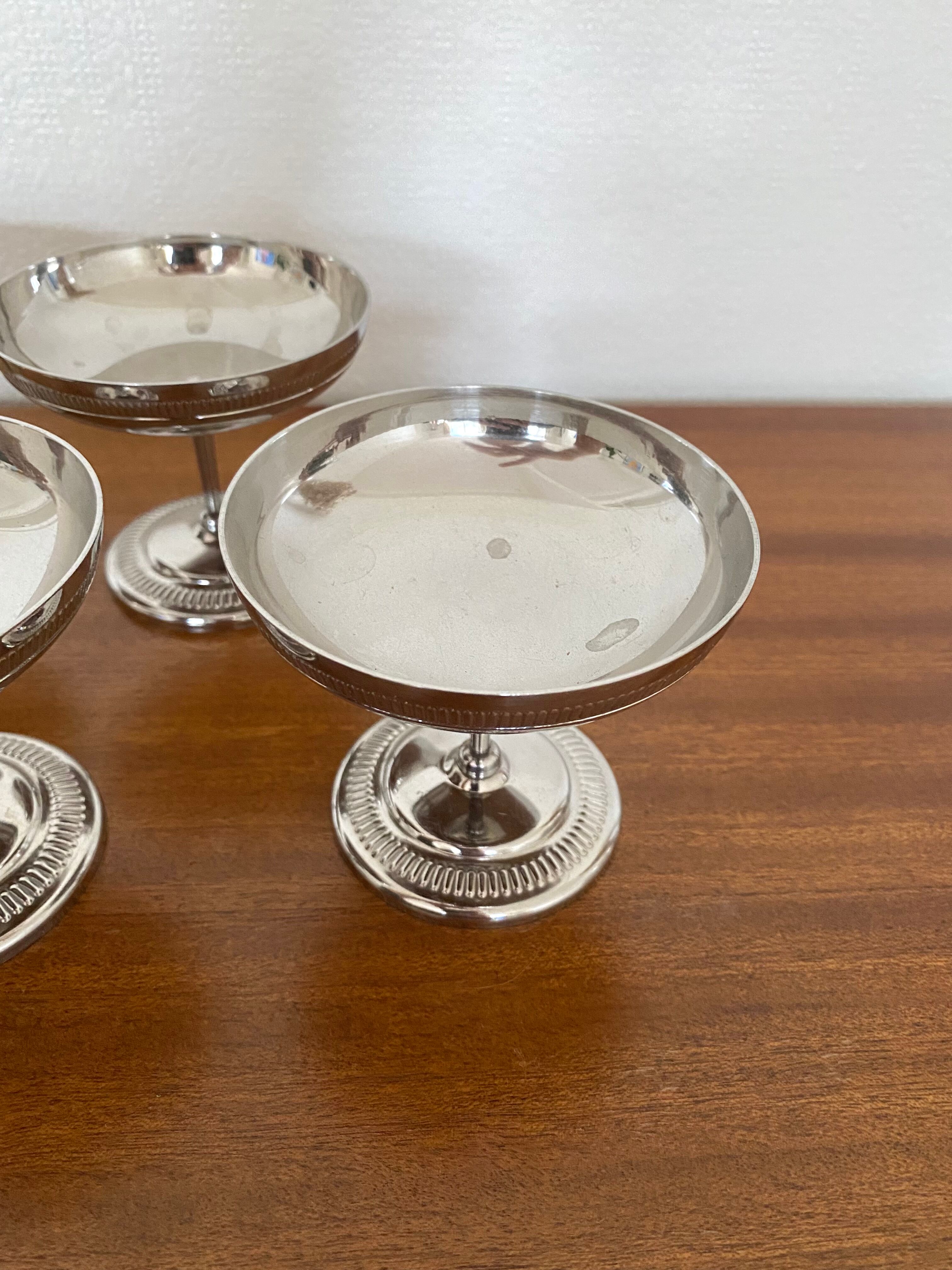 Old silver metal standing ice cups