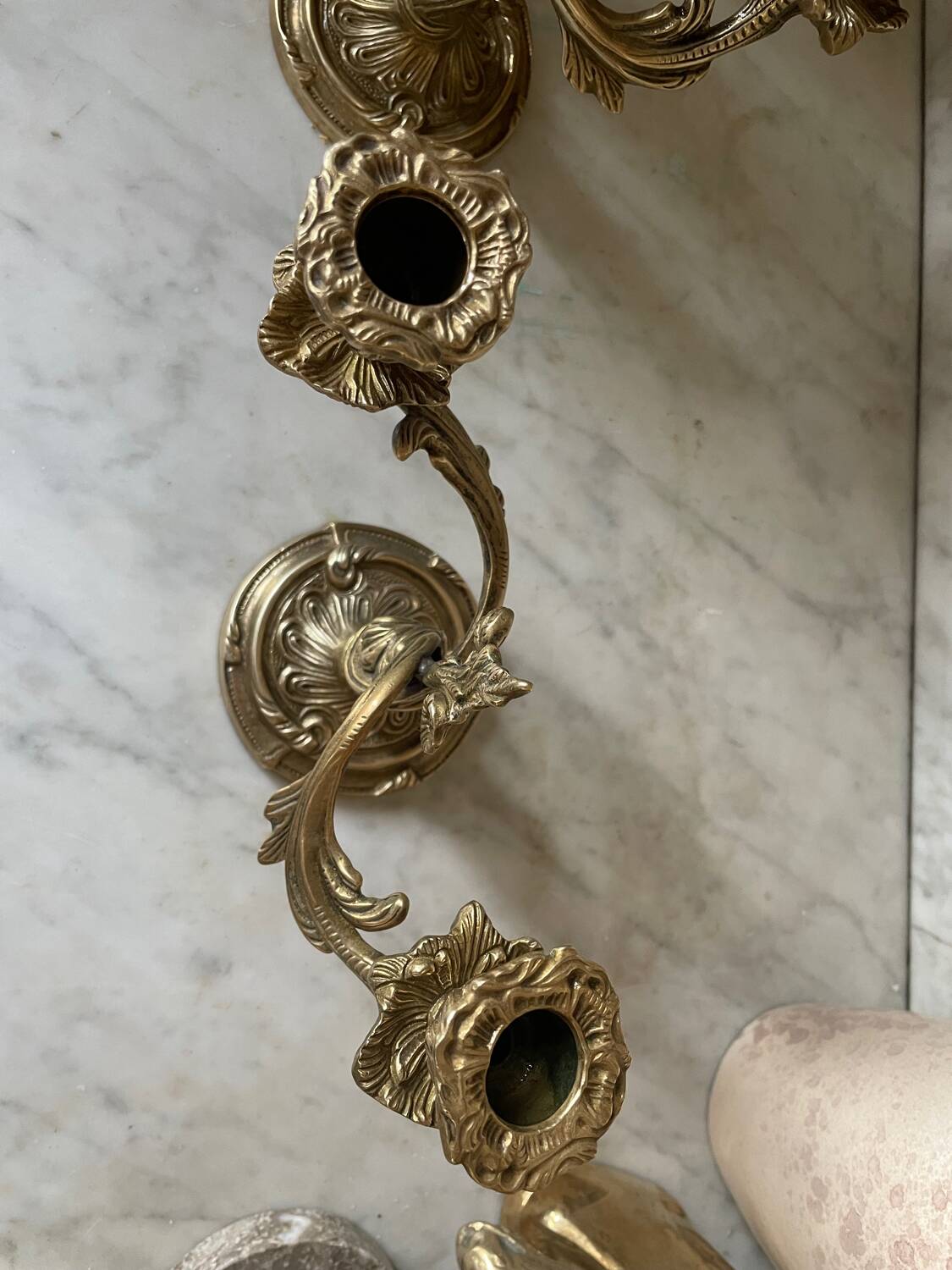 Pair of rocaille candlesticks in gilded bronze