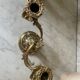 Pair of rocaille candlesticks in gilded bronze