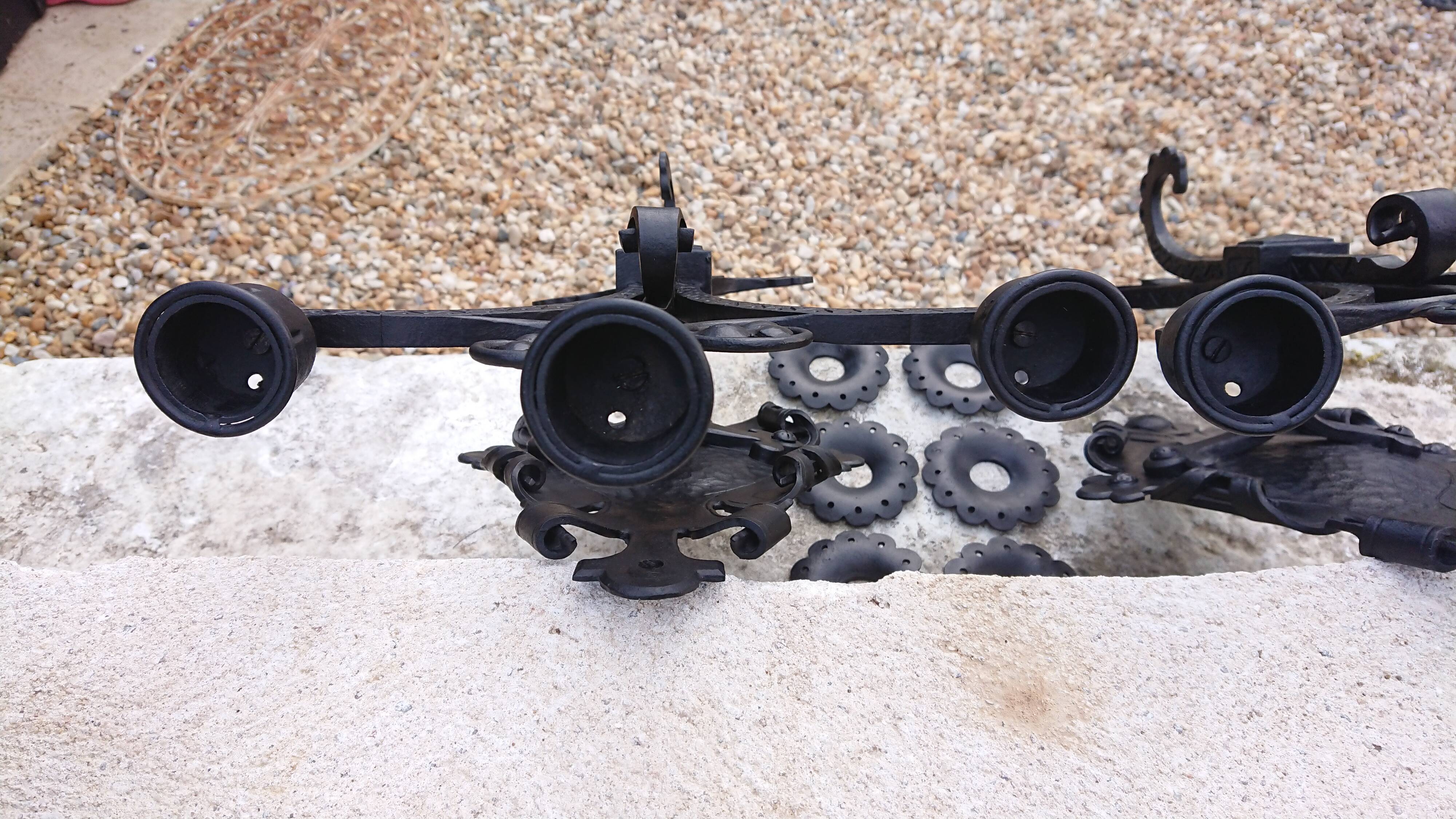 Pair of black wrought iron sconces - neo-Gothic style - from the 1950s