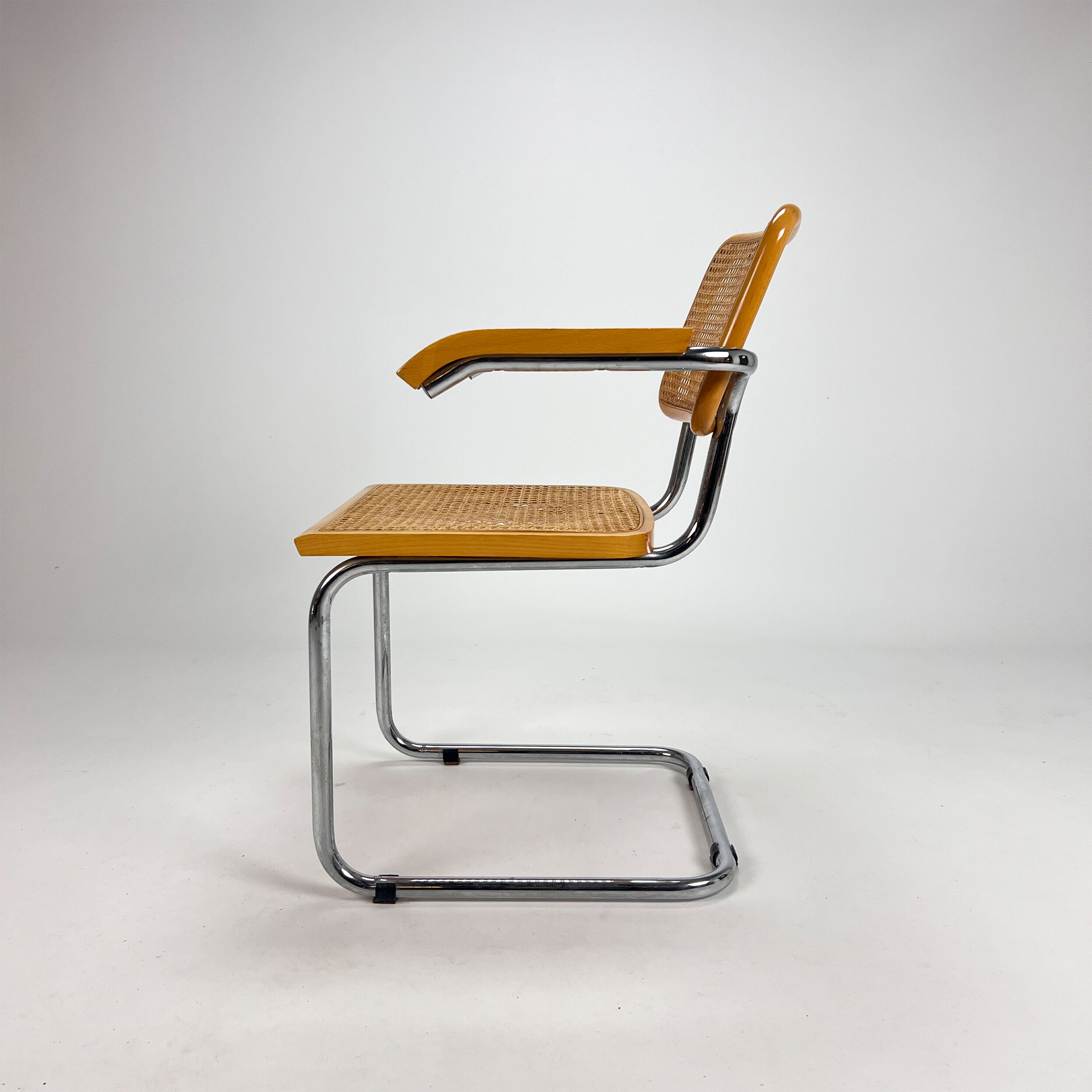 Tubular frame and cane cantilever dining chair, italy, 1970s
