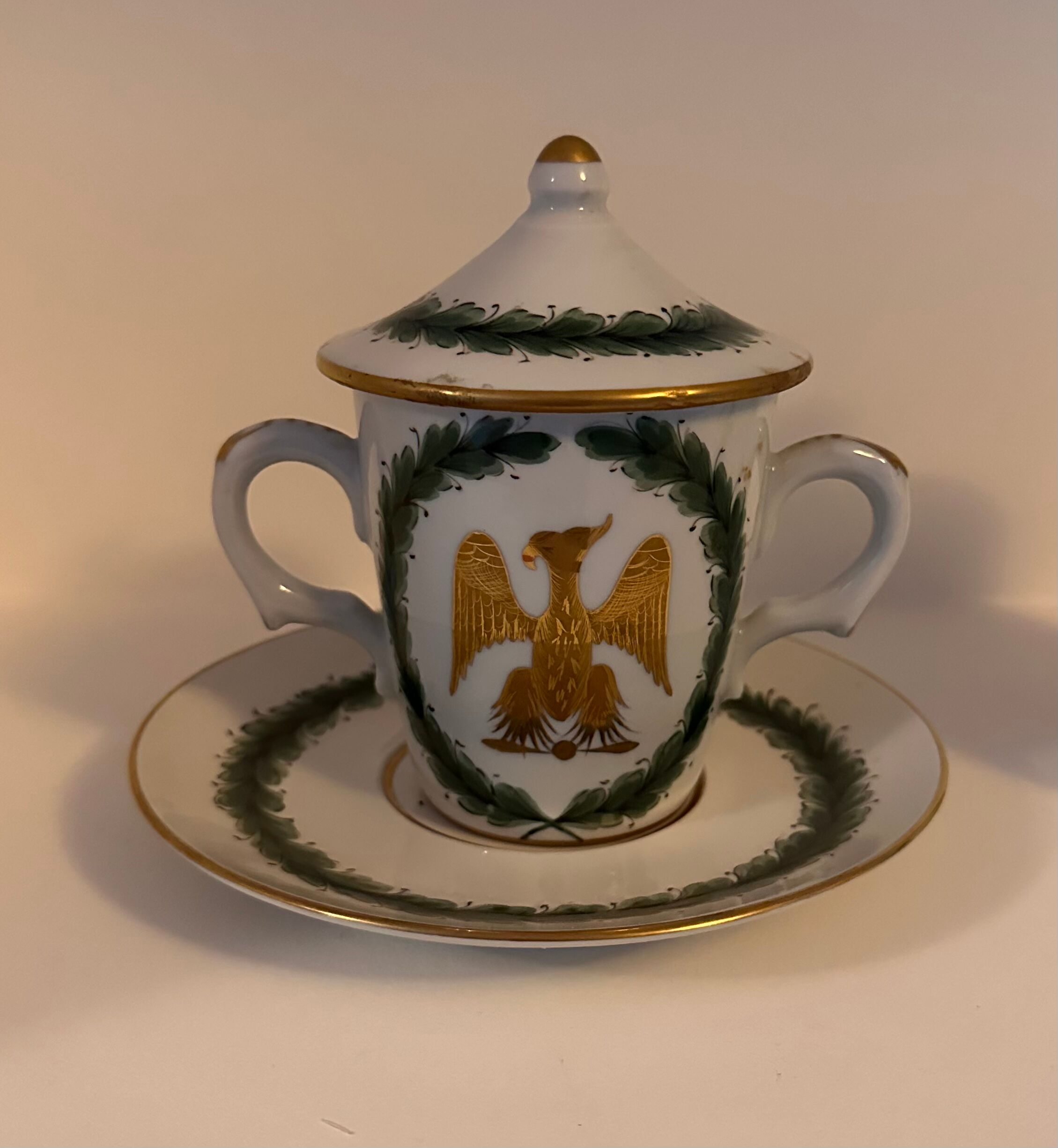 Porcelain cup of snake in the colors of Napoleon with its saucer and lid