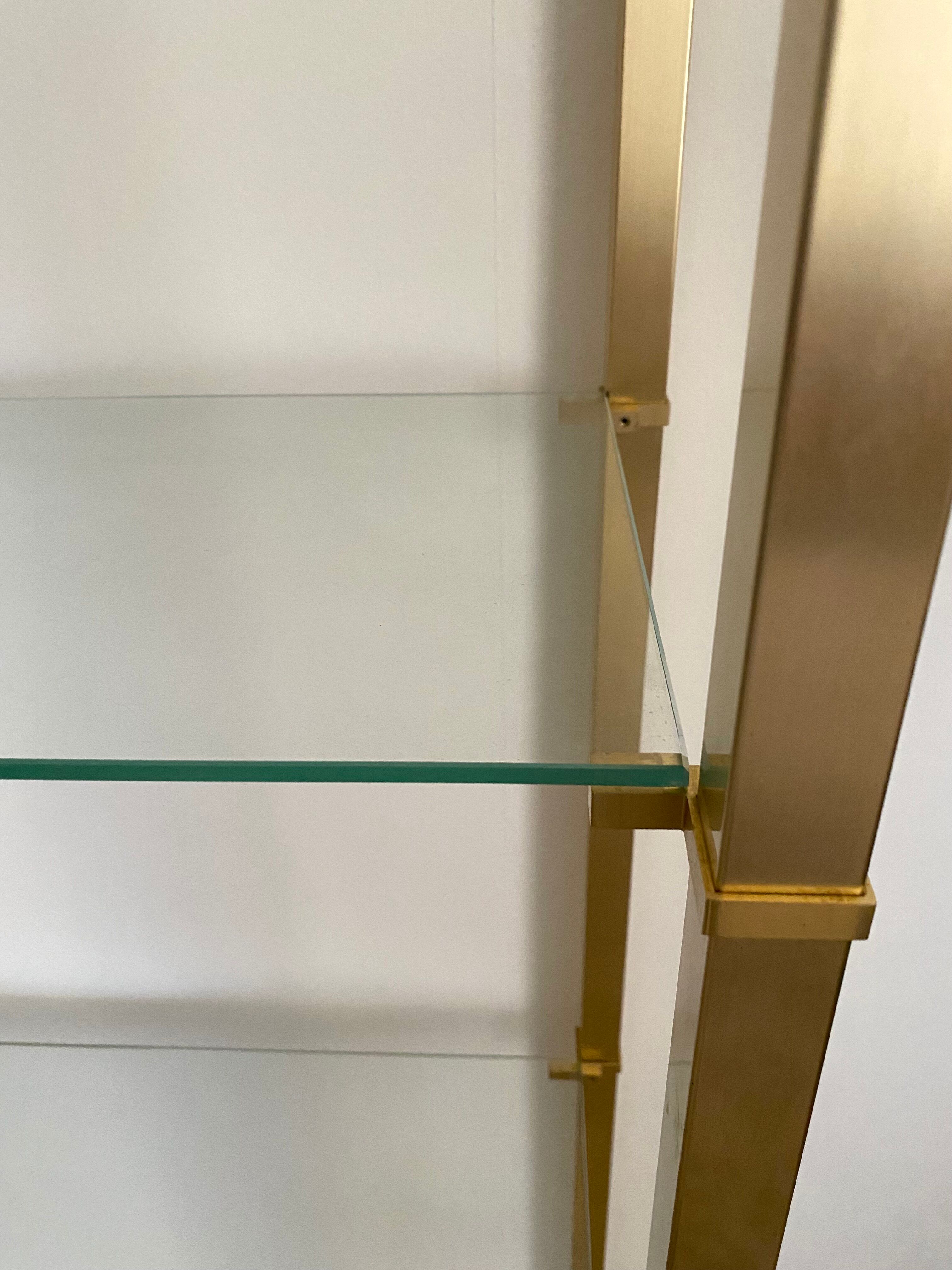 Bookcase in gilded metal and glass, Pierre Vandel Paris, circa 70