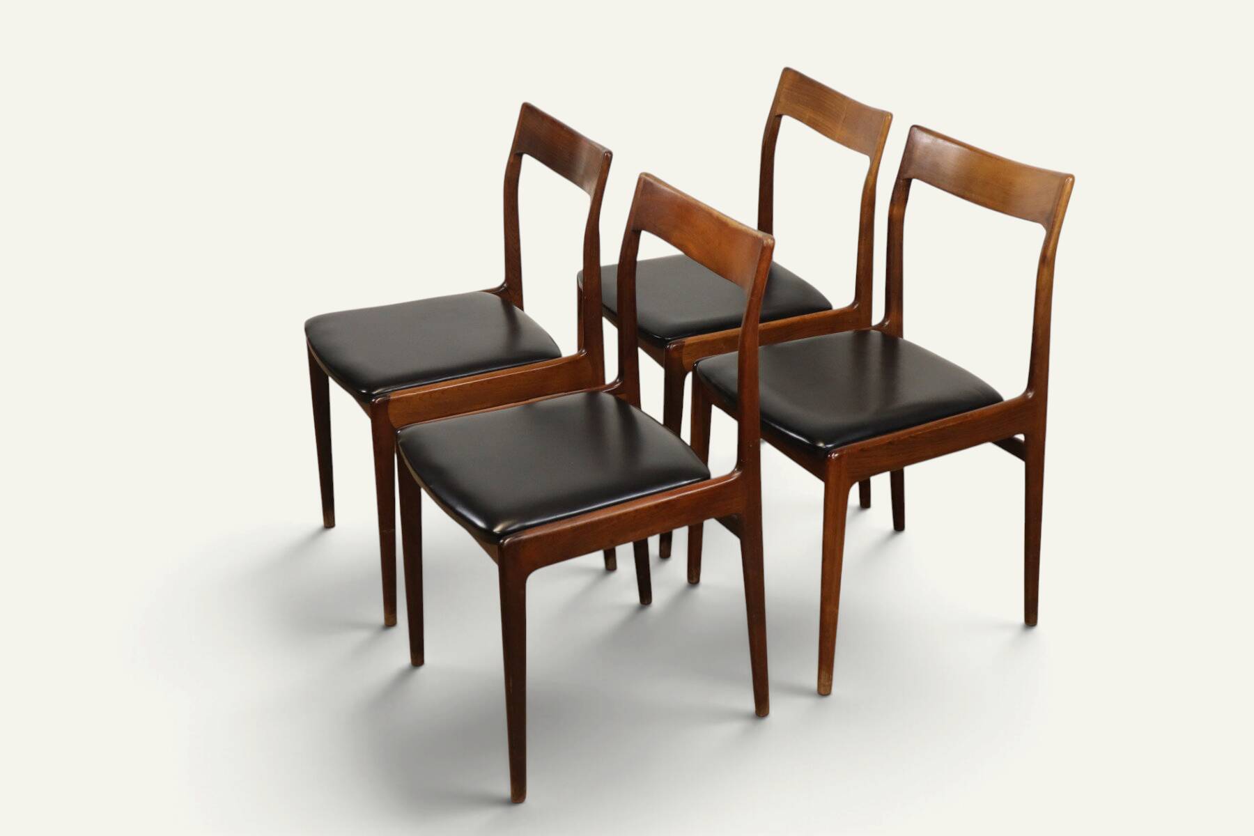 Set of 4 vintage teak and black faux leather chairs – 1960s