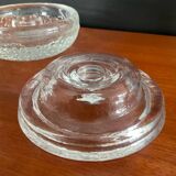 Set of three round thick moulded glass candle holders