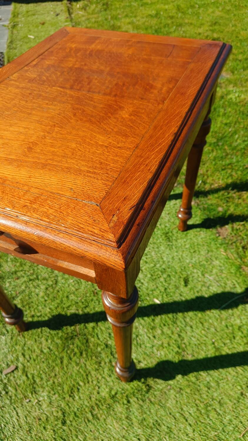 Antique solid wood table with a through drawer.