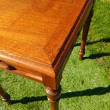Antique solid wood table with a through drawer.
