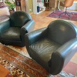 Green leather club chairs