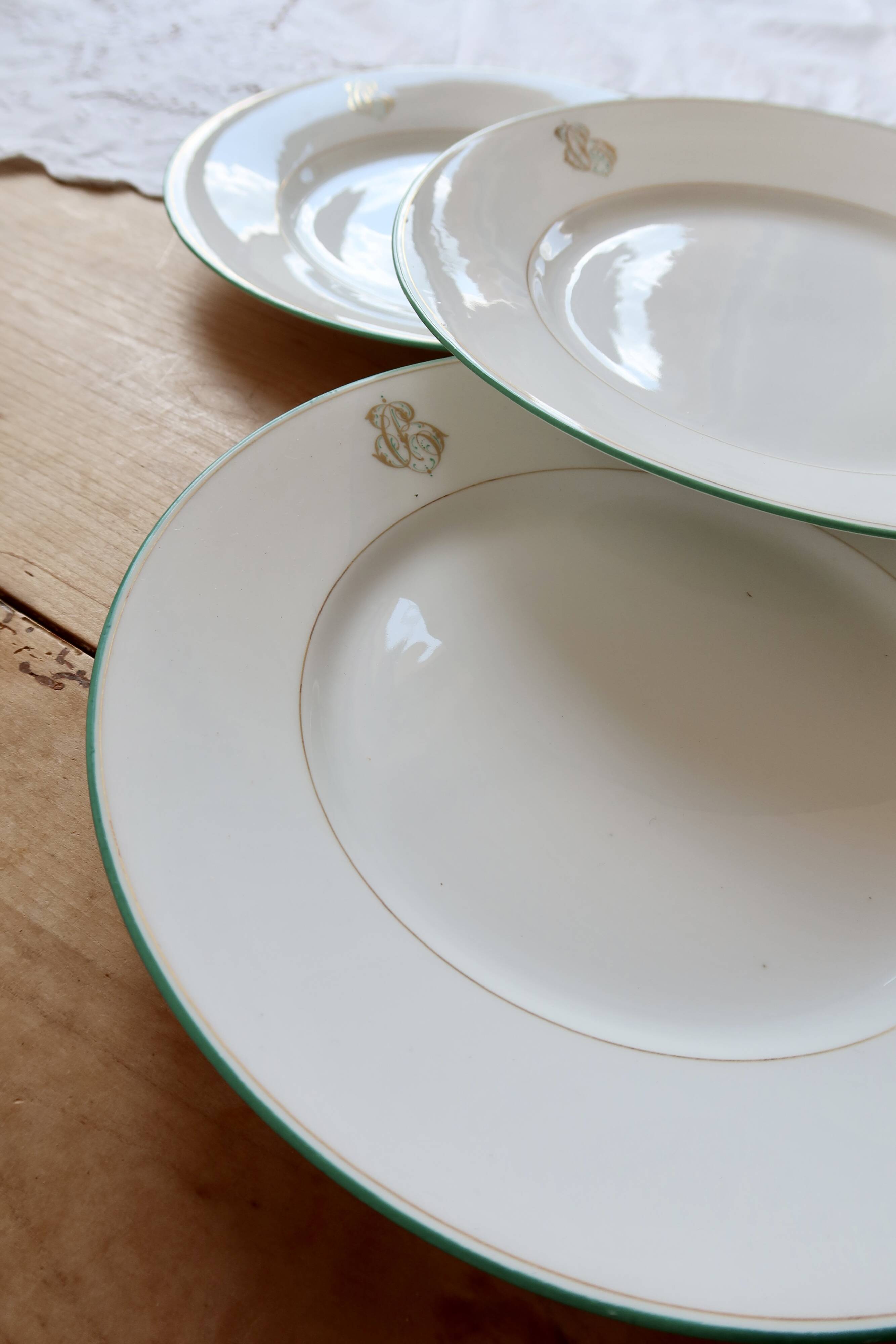 4 antique monogrammed plates made of Limoges porcelain