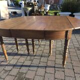 12-foot round oak table with 7 extensions / 20 people